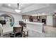 Open-concept kitchen with an island and an adjacent dining area at 544 N Fogg St, Las Vegas, NV 89110