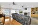 Cozy living room with a fireplace and hardwood flooring at 544 N Fogg St, Las Vegas, NV 89110