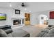 Elegant living room with fireplace and built-in shelving at 544 N Fogg St, Las Vegas, NV 89110