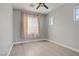 Bright bedroom with hardwood floors, ceiling fan, and lots of natural light at 626 Taliput Palm Pl, Henderson, NV 89011