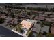 An elevated view showing the pool, desert landscaping, and layout of the house at 6292 Belgium Dr, Las Vegas, NV 89122