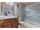 Bathroom featuring a glass shower enclosure, a marble vanity top, and modern fixtures at 6292 Belgium Dr, Las Vegas, NV 89122