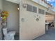Small outdoor toilet and shower area with a chrome shower head and wall decor at 6292 Belgium Dr, Las Vegas, NV 89122