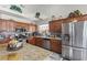This is a view of the kitchen with granite countertops, a tile backsplash, and stainless steel appliances at 6292 Belgium Dr, Las Vegas, NV 89122