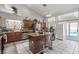 Spacious kitchen with granite countertops, stainless steel appliances, and island seating at 6292 Belgium Dr, Las Vegas, NV 89122