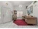 Elegant living room with decorative furnishings, chandelier, and ample natural light at 6292 Belgium Dr, Las Vegas, NV 89122