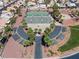 Aerial view of the neighborhood park featuring tennis and basketball courts and mature trees at 6292 Belgium Dr, Las Vegas, NV 89122