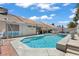 Backyard featuring a refreshing pool and jacuzzi, perfect for outdoor relaxation and enjoyment at 6292 Belgium Dr, Las Vegas, NV 89122