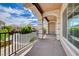 Enjoy this expansive covered balcony with decorative columns, providing ample space for outdoor relaxation at 6402 Parrot Ridge Ct, Las Vegas, NV 89139