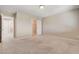 Spacious bedroom with carpet flooring, walk-in closet, and easy access to other rooms at 6402 Parrot Ridge Ct, Las Vegas, NV 89139