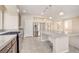 Modern kitchen with stainless steel appliances, granite countertops, and a large island with seating at 6402 Parrot Ridge Ct, Las Vegas, NV 89139