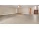 Open floor plan with tile flooring throughout and stairs leading to the second level, plenty of natural light at 6402 Parrot Ridge Ct, Las Vegas, NV 89139