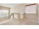 Loft area with carpet flooring and natural light at 6402 Parrot Ridge Ct, Las Vegas, NV 89139