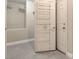 Organized walk-in closet with built-in shelving units for storage and a practical door-mounted rack for additional organization at 6402 Parrot Ridge Ct, Las Vegas, NV 89139