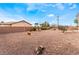 Spacious backyard with desert landscaping and open space at 7076 Oakleigh Dr, Las Vegas, NV 89110