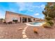 Backyard showcasing a pool, spa, and desert landscaping at 7076 Oakleigh Dr, Las Vegas, NV 89110