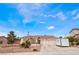 Charming single-story home featuring a well-manicured yard and a three-car garage at 7076 Oakleigh Dr, Las Vegas, NV 89110