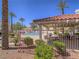 Community pool and seating area, perfect for relaxation and socializing at 713 Wheat Ridge Ln # 102, Las Vegas, NV 89145