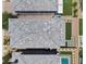 Aerial view of the property showcasing the roof, landscaping, and the well-manicured backyard at 7456 Tinley Creek Ave, Las Vegas, NV 89113