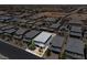 A beautiful aerial view of a suburban neighborhood with desert scenery in the background at 7456 Tinley Creek Ave, Las Vegas, NV 89113