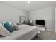 This bedroom is bright and features plush carpet and neutral decor at 7456 Tinley Creek Ave, Las Vegas, NV 89113