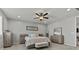 Spacious main bedroom features ceiling fan, neutral decor, and light wood furnishings at 7456 Tinley Creek Ave, Las Vegas, NV 89113