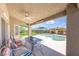 Inviting covered patio overlooking a refreshing pool, perfect for outdoor entertaining and relaxation at 747 Canyon Crest Dr, Las Vegas, NV 89123