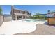 Backyard featuring a patio, large pool, storage shed, and shaded lounge area at 747 Canyon Crest Dr, Las Vegas, NV 89123