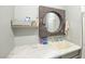 Functional bathroom featuring a marble countertop, decorative mirror, and ample space at 747 Canyon Crest Dr, Las Vegas, NV 89123