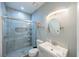 Contemporary bathroom featuring sleek fixtures, a glass-enclosed shower, and modern tile accents at 747 Canyon Crest Dr, Las Vegas, NV 89123