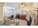 Bedroom with carpeted floors, a ceiling fan, and a large window with natural light at 747 Canyon Crest Dr, Las Vegas, NV 89123