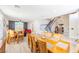 Bright dining area featuring tile floors, wooden table with seating for ten, and natural light at 747 Canyon Crest Dr, Las Vegas, NV 89123