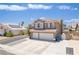 A charming two story house with a three car garage at 747 Canyon Crest Dr, Las Vegas, NV 89123