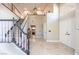 Grand foyer with staircase and high ceilings showcasing the home's elegant entry at 747 Canyon Crest Dr, Las Vegas, NV 89123