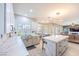 This lovely bright kitchen features an island with a breakfast bar and stainless steel appliances at 747 Canyon Crest Dr, Las Vegas, NV 89123