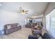 Living room features an open concept design with recessed lights and a ceiling fan at 747 Canyon Crest Dr, Las Vegas, NV 89123