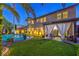 Beautiful backyard with a well-maintained lawn, pool, and covered patio area, ideal for outdoor living at 7908 Horse Bridle St, Las Vegas, NV 89131