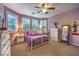 Cozy bedroom featuring carpet, natural light, and neutral paint at 7908 Horse Bridle St, Las Vegas, NV 89131