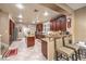 Well-lit kitchen showcasing an island with seating, stainless steel appliances, and ample counter space at 7908 Horse Bridle St, Las Vegas, NV 89131