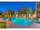 Expansive pool area featuring a separate spa and mature landscaping, perfect for outdoor relaxation at 7908 Horse Bridle St, Las Vegas, NV 89131