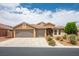 Inviting single-Gathering home featuring a large driveway, desert landscaping, and three-car garage at 8340 Jeremiahs Lodge Ave, Las Vegas, NV 89131