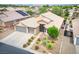 Well-kept single-Gathering home with low-maintenance landscaping, desert foliage and three-car garage at 8340 Jeremiahs Lodge Ave, Las Vegas, NV 89131