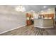 Bright dining area adjacent to the kitchen featuring tile flooring, a chandelier, and ample lighting at 8340 Jeremiahs Lodge Ave, Las Vegas, NV 89131