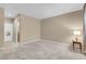 Neutral bedroom with a large doorway leading to a possible en-suite bathroom at 9900 Summer Ash Ct # 101, Las Vegas, NV 89134