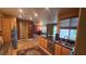 Open-concept kitchen featuring stainless steel appliances, granite countertops, and ample cabinet space, flowing into the living area at 9900 Summer Ash Ct # 101, Las Vegas, NV 89134