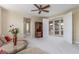 Spacious bonus room with a built-in cabinet and patio access at 9992 Peak Lookout St, Las Vegas, NV 89178