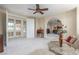 Bonus room with a step-up platform, patio access and an arched entry at 9992 Peak Lookout St, Las Vegas, NV 89178