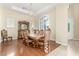 Formal dining room with hardwood floors and chandelier at 9992 Peak Lookout St, Las Vegas, NV 89178