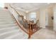 Formal dining room with staircase and wainscoting at 9992 Peak Lookout St, Las Vegas, NV 89178