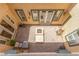 Exterior view of a backyard patio with a sitting area and fireplace at 9992 Peak Lookout St, Las Vegas, NV 89178